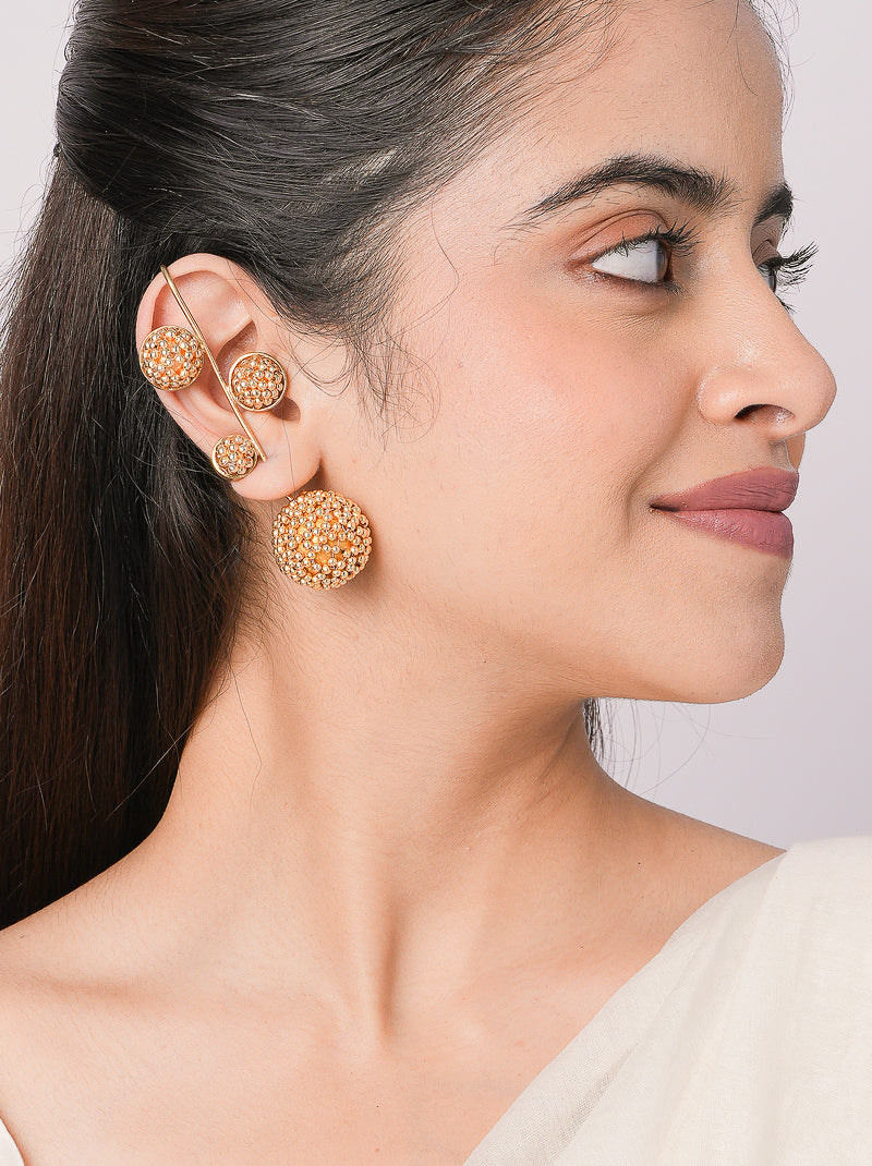 Soni Crystal Ball Earcuff featuring crystal-encrusted spheres on a sleek gold tone ear-climbing design for contemporary festive and party styling.