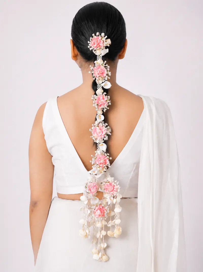 Varij Floral Style Braid handcrafted with blush pink flowers, faux pearls and cascading floral tassels for elegant bridal braid hairstyles.